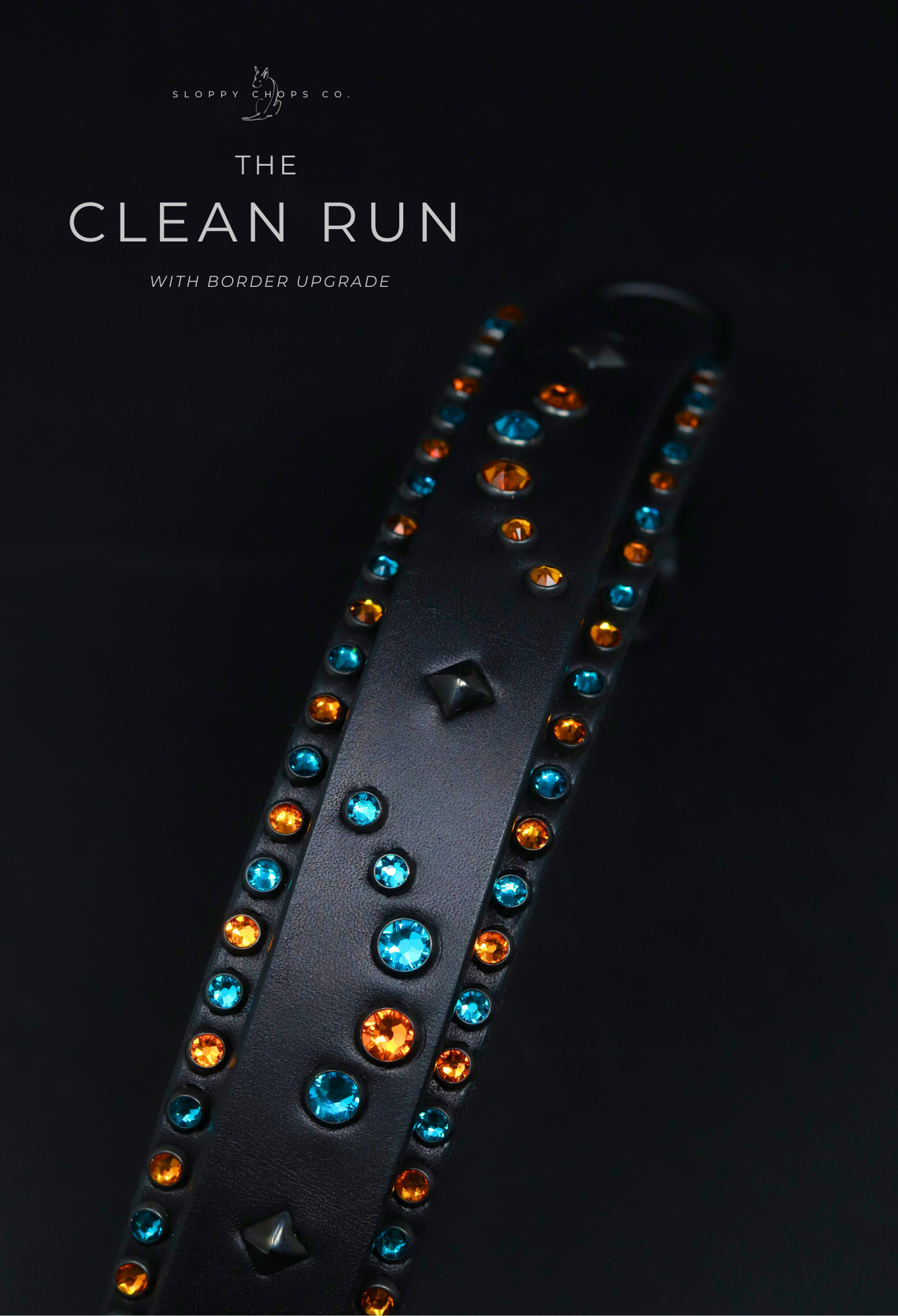 Custom black leather collar featuring blue and tangerine crystals with black pyramid studs on dark background