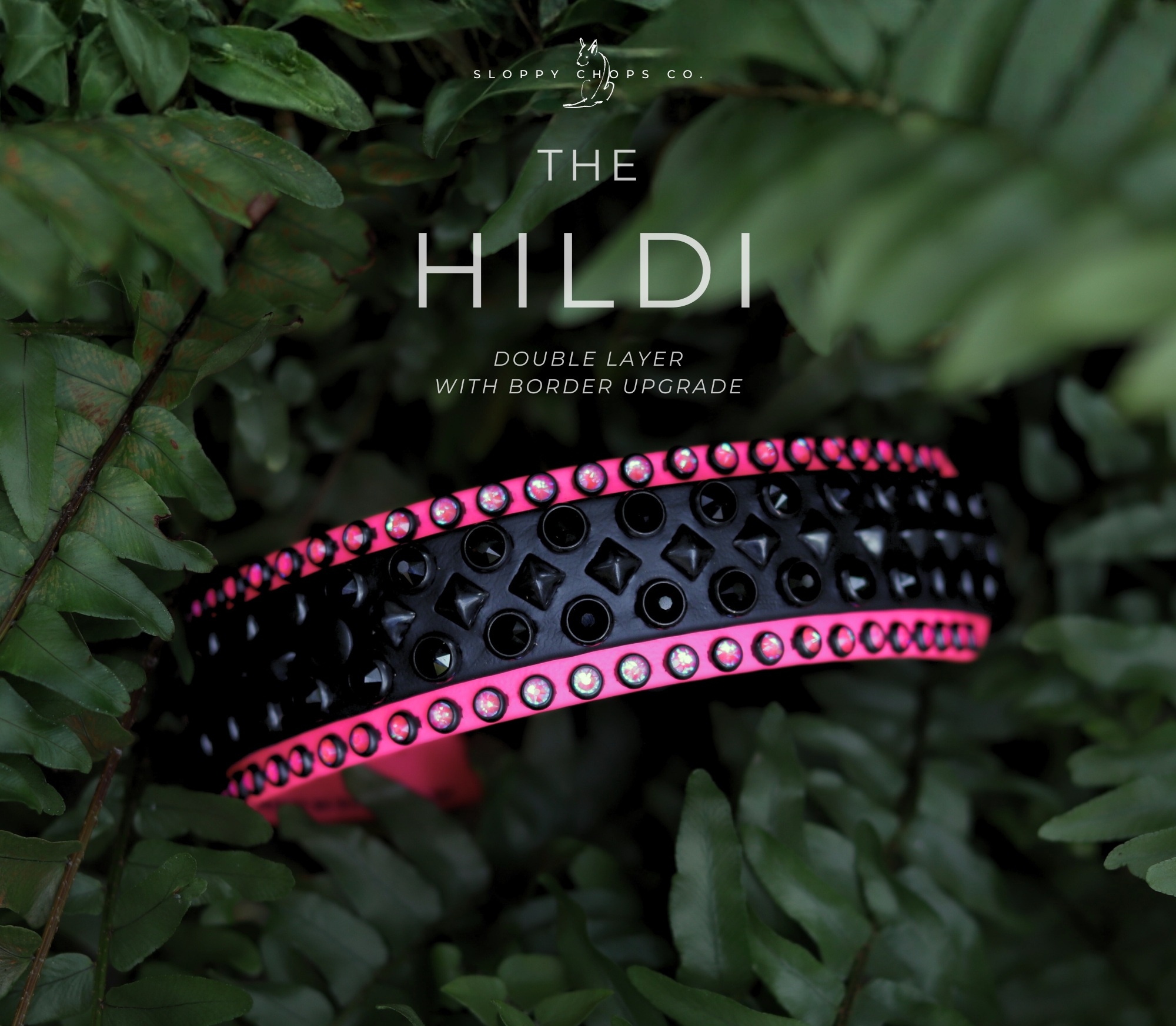 Double-layer black and pink collar with pink rhinestones and black pyramid studs nestled in green foliage